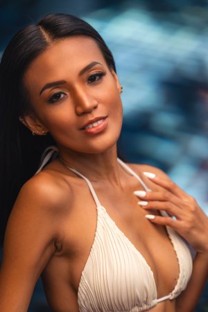 Donnabelle teasing her wet heat in white lingerie by the poolside under natural light — Donnabelle #2