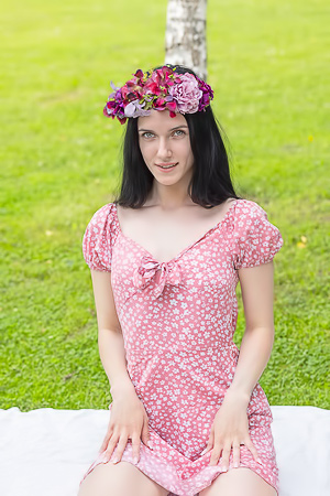 Posy, black hair and flower crown, posing nude on white blanket in grass, solo outdoor tease
