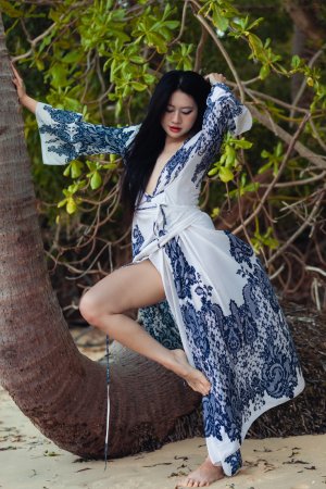 May starts poised in robe then bares all under palms her body telling a slow tease story — May #2