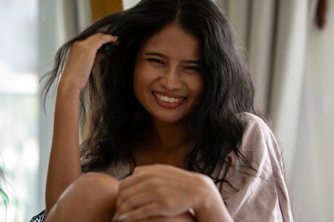 Bua in the bedroom chair commanding attention topless and nude posing with mirror reflections — Bua #24