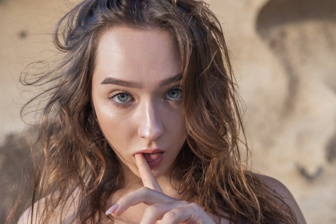 Bozhena bares all in a white dress at the cave, topless poses with flip flops on sunlit rocks — Bozhena #10