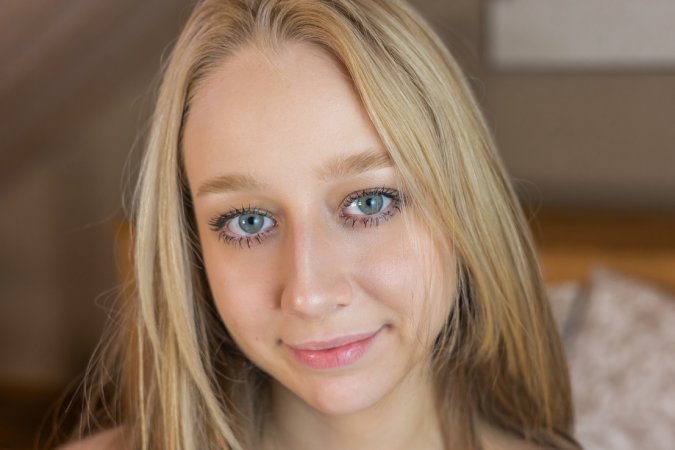 Arete fingers her wet pussy in teal lace while lounging on the bed in a fur coat — Arete #24