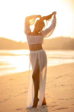 Sensual Bua bares her curves in sheer white lingerie on a golden beach at sunset posing solo — Bua #5