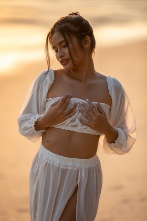 Sensual Bua bares her curves in sheer white lingerie on a golden beach at sunset posing solo — Bua #6