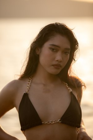 Minari bares all in the sea at sunset, posing nude with hands on her body, smiling — Minari #2