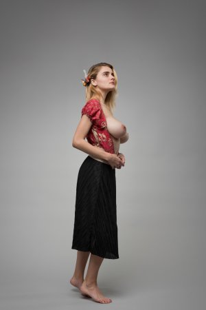 Marria Leeah stands bare in studio heat, red lace slipping as she poses with flower crown command — Marria Leeah #6