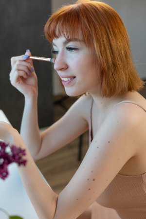 Monica I craves her own touch, teasing bare on desk and wicker chair with blue nails gleaming — Monica I #2