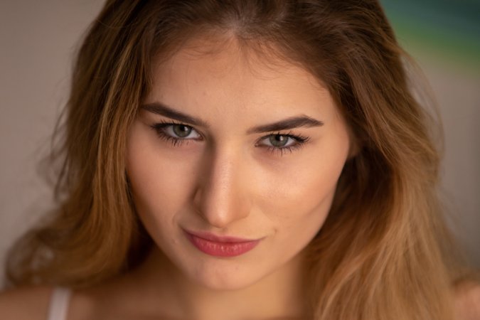 Lorelei posing nude and in floral lingerie on a cushioned bench in a bright bedroom setting — Lorelei #2
