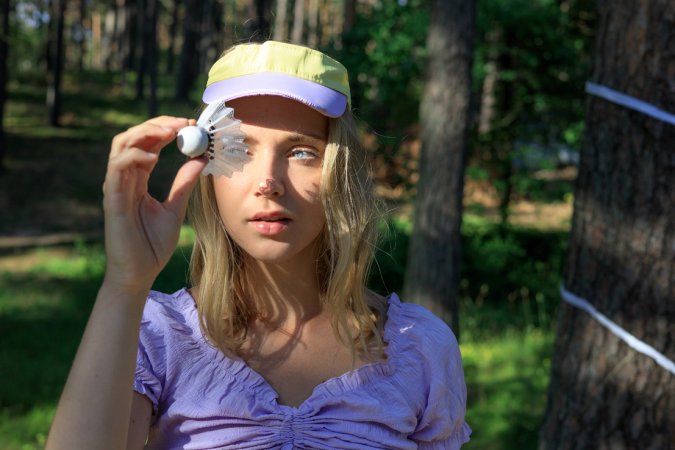 Oxana Z. strips bare in the forest with her tennis racket, posing solo in a white skirt and visor — Oxana Z. #2