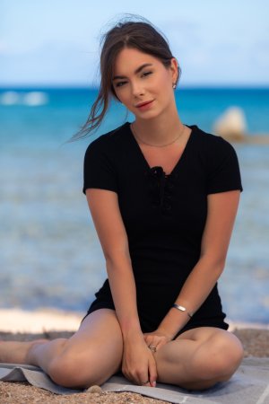 Liz Ocean bares her skin on sandy beach towels, ocean breeze teasing her curves as she poses nude — Liz Ocean #1