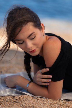 Liz Ocean bares her skin on sandy beach towels, ocean breeze teasing her curves as she poses nude — Liz Ocean #5